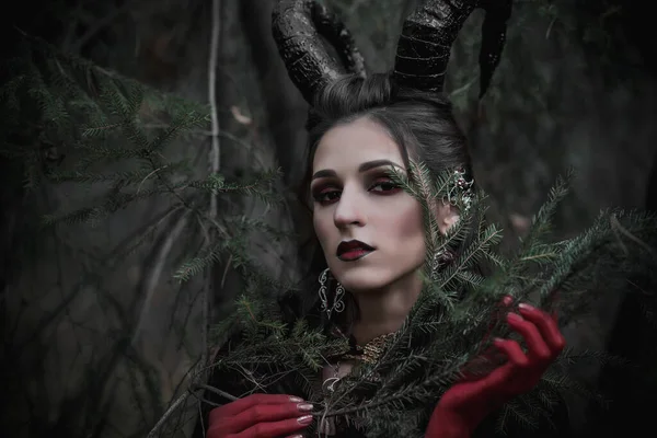 Dark fairy in the forest