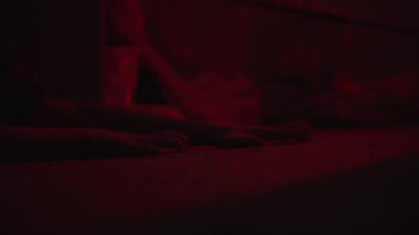 Desperate Hands Reaching for Help Sad Woman Lying on the Floor in Emotional Distress. High quality 4k footage