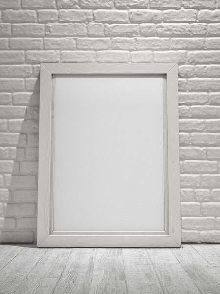 Wooden canvas frame on white brick wall background