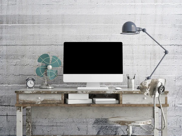 Bespotten monitor op tafel, concrete achtergrond — Stockfoto