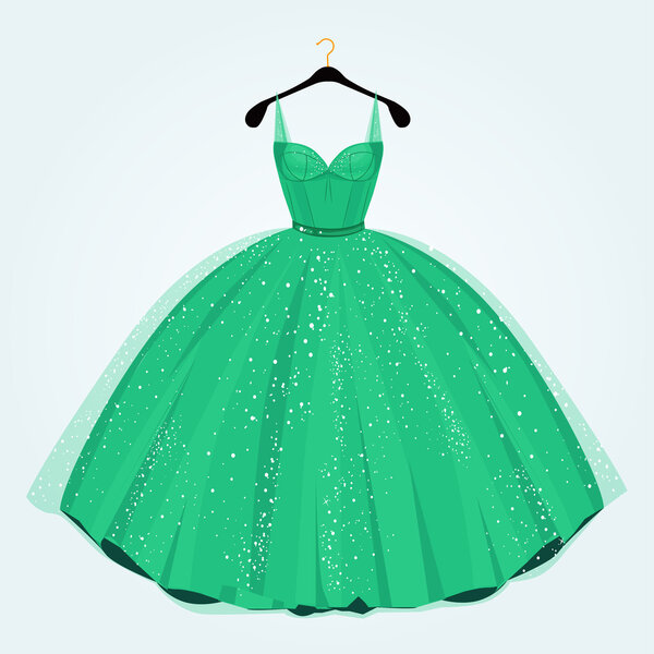 Зеленое платье для особого мероприятия на вешалке. Вечеринка платья.
