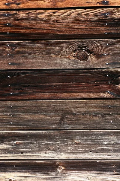 Old, brown boards closeup with nails. — Stock Photo, Image