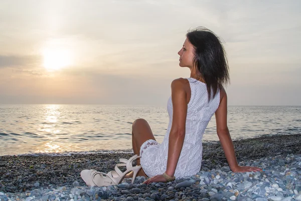 Beautiful girl in a white dress — Stock Photo, Image