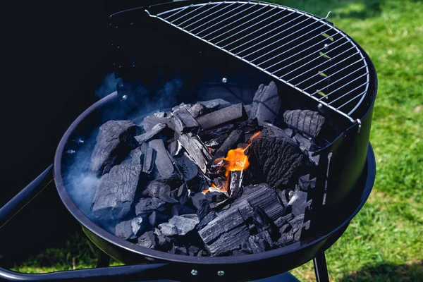heated charcoal in a barbecue, outdoor recreation