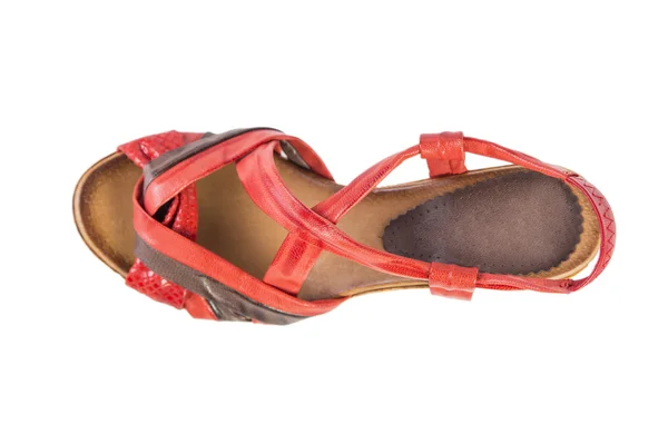 Женские красные сандалии на белом фоне, интернет-магазин — стоковое фото