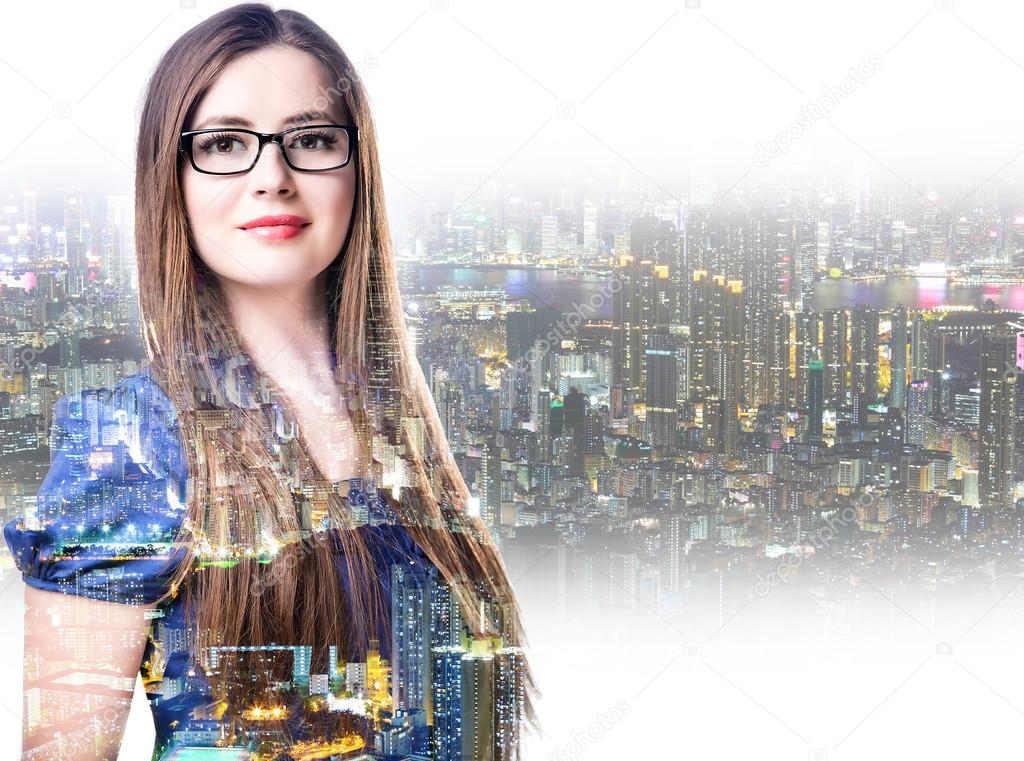 Double Exposure, girl on the background of the city, business woman