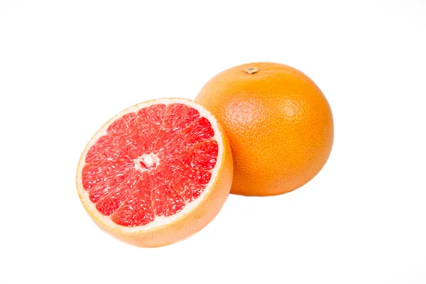 Skära grapefrukt på vit bakgrund — Stockfoto