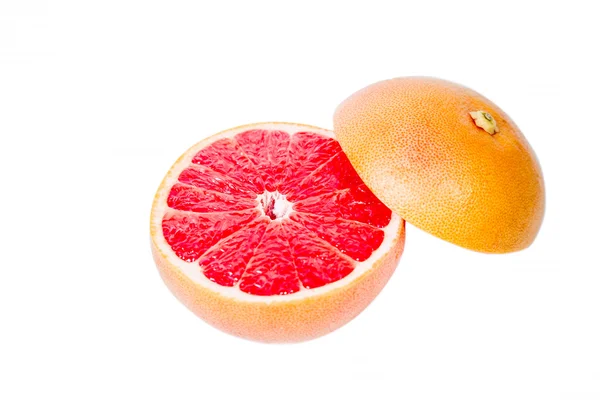 Gesneden grapefruit op een witte achtergrond — Stockfoto