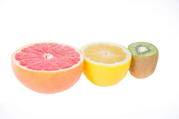 Fruta de pedestal, fruta ligera, kiwi, pomelo, limón — Foto de Stock