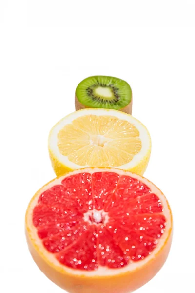 Pedestal fruit, light fruit, kiwi, grapefruit, lemon — Stock Photo, Image