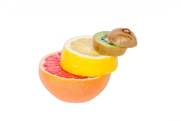 Piedestal av frukterna faller frukt, balans, grapefrukt, kiwi, citron — Stockfoto