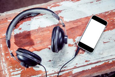 kulaklık ve telefonu vintage fotoğraf, müzik dinlemek