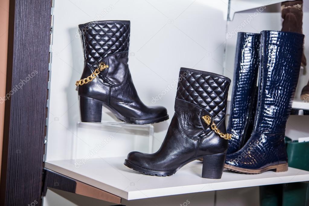 black and gold leather boots