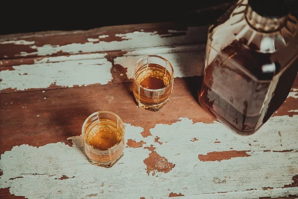 Two glasses of whiskey standing on the bar — Stock Photo, Image