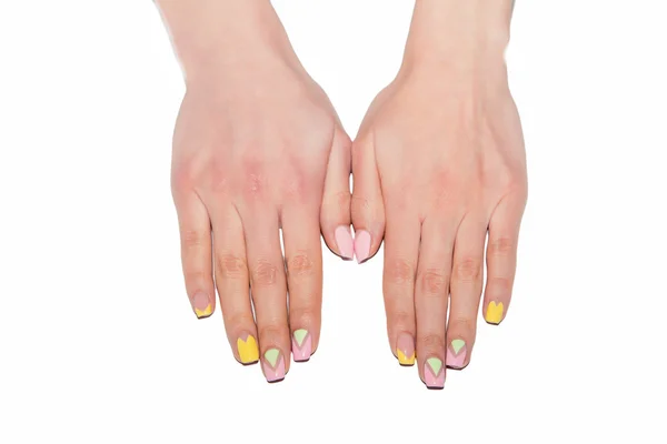 Manicure feminino, as mãos das mulheres em um fundo branco — Fotografia de Stock