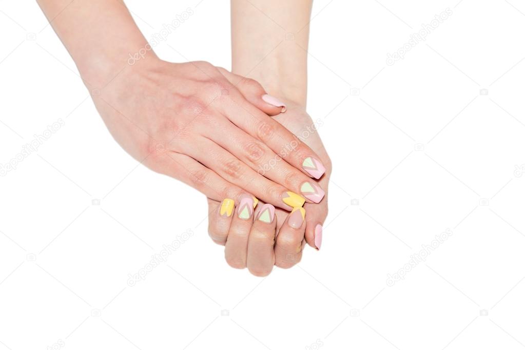 Female Manicure, women's hands on a white background