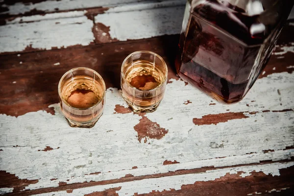 Two glasses of whiskey standing on the bar — Stock Photo, Image