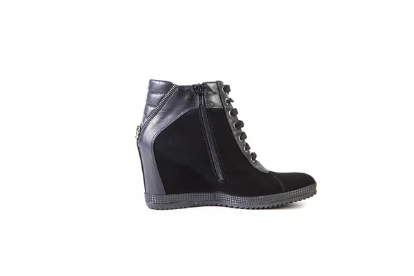 Suede women's boots on a white background, black shoes, autumn and winter, side view — 图库照片