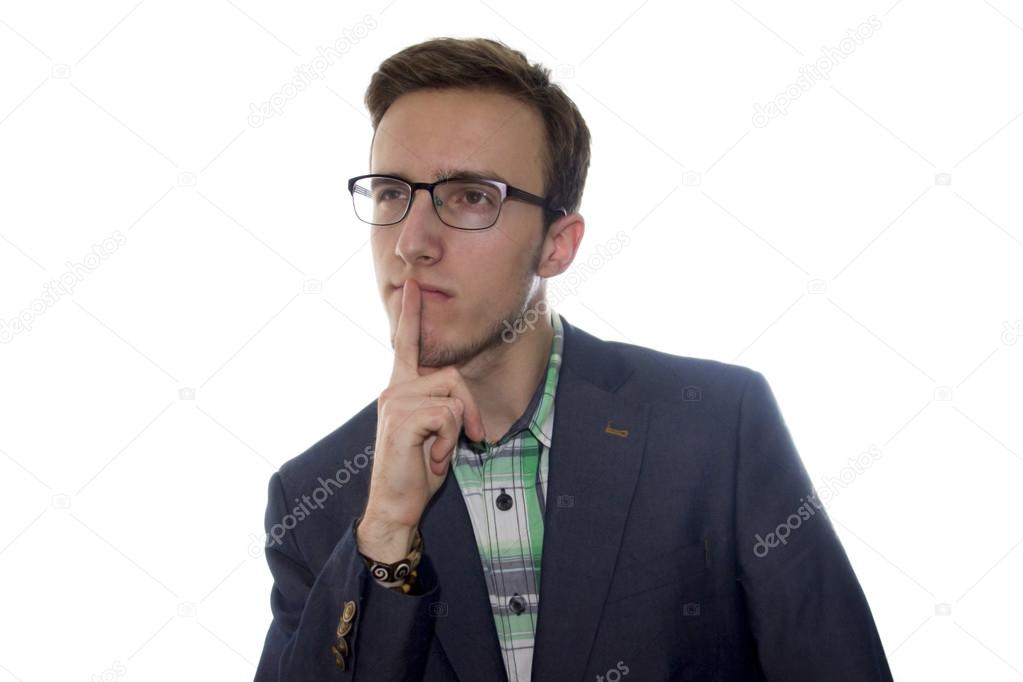 Young handsome man deep in thought in white background