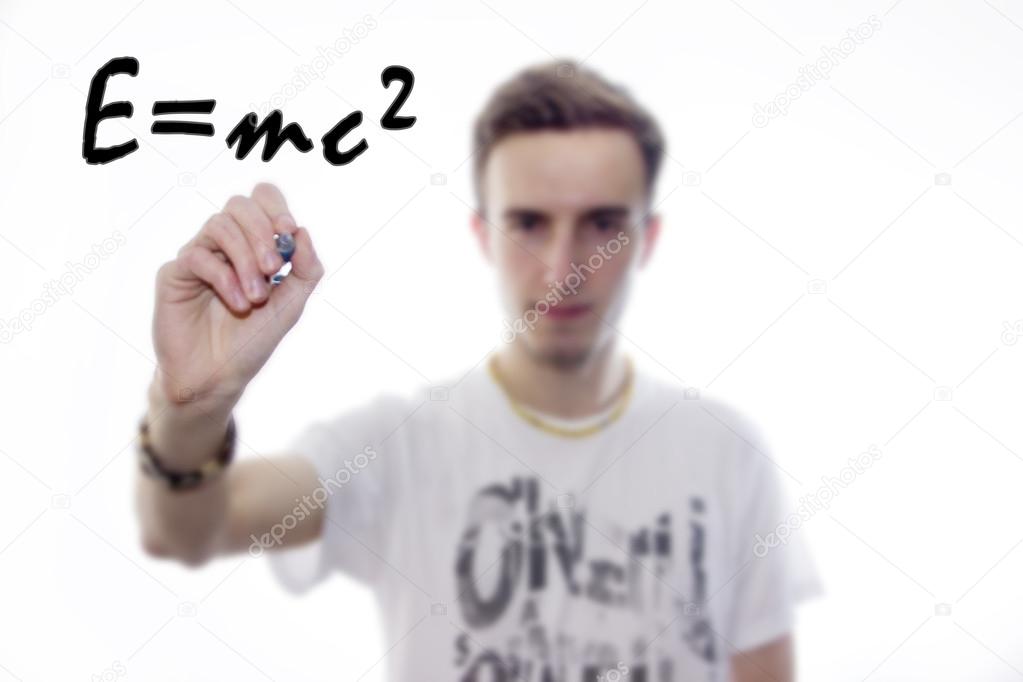 Man writes mathematical equations on whiteboard