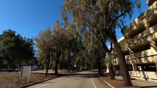 Stanford California USA - January 2020. Driving slowly empty university campus , no students — Stock Video