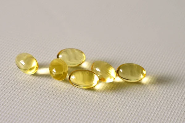 Omega Fish Liver Oil Capsules White Background Pile Big Golden — Stock Photo, Image