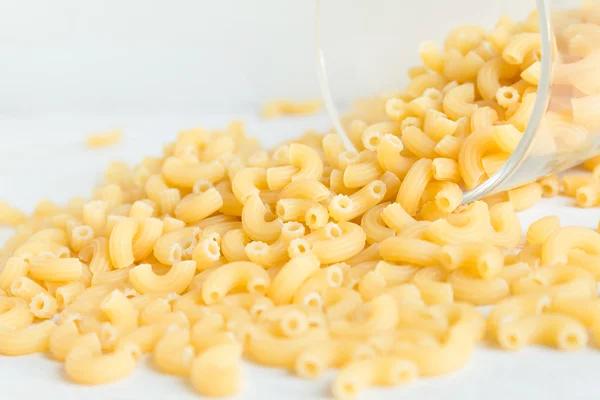 Close-up van droge elleboog macaroni pasta Rechtenvrije Stockafbeeldingen