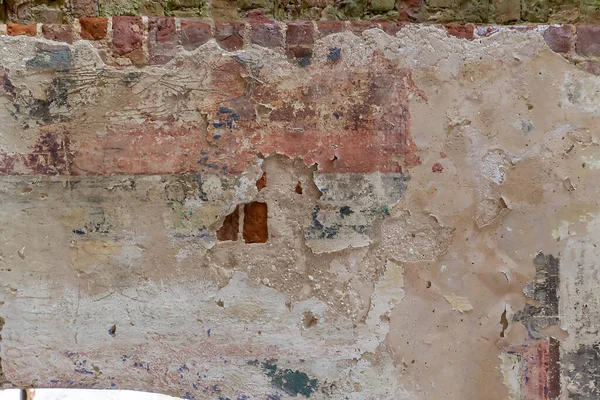 remains of drawings on the walls of a destroyed Orthodox church, Troitskoye village, Kostroma region, Russia