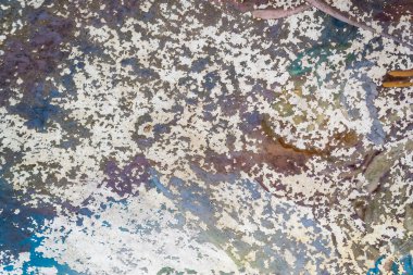 Eski boyalı bir duvarın dokusu, soyulmuş boyayla