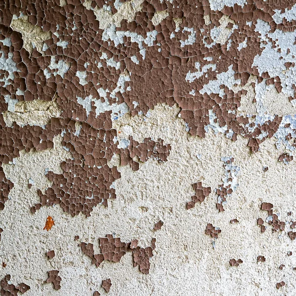 the texture of antique paint on a stone wall