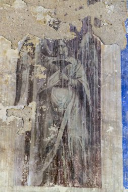 Terk edilmiş bir kilisenin duvarındaki, Rusya 'nın Kostroma eyaletindeki Nikitskoye köyünün İncil' den örnekler. İnşaat yılı 1789. Şu anda tapınak terk edilmiş durumda..