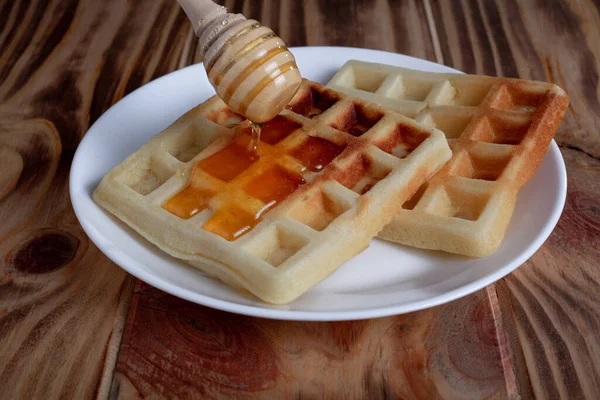 Pouring Honey Belgian Viennese Waffles White Plate Wooden Table Using — Stock Photo, Image