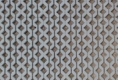 Whiting Green Grass 'ın Geometrik Betonu. Çimenler için Delikli Eko Park Hücreleri Gri Beton Döşeme.