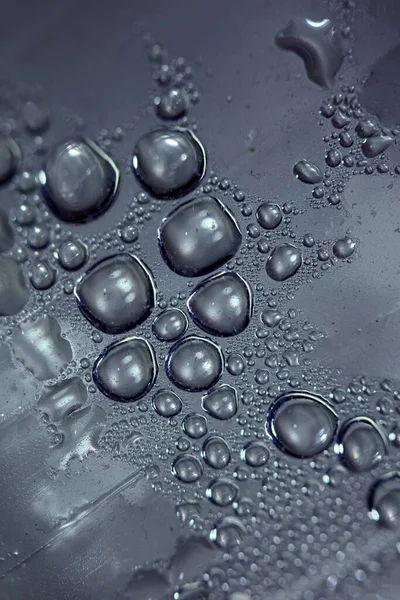 Macro shooting of water droplets beside the glass surface close up liquid drops modern background pattern high quality prints