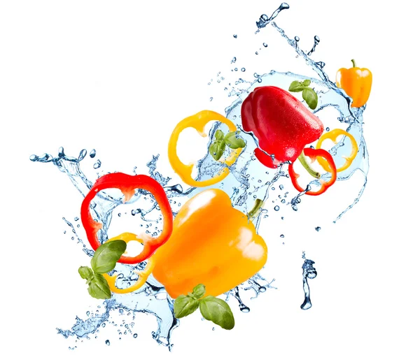 Water splash met groente — Stockfoto