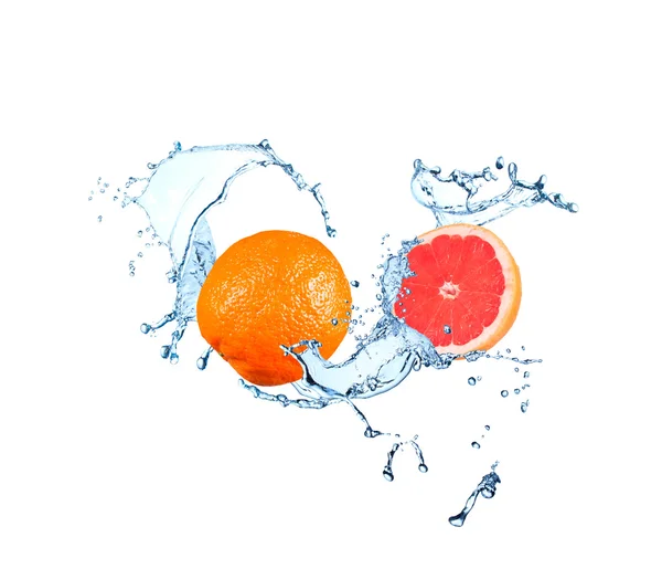 Grapefruits falling in water splash — Stock Photo, Image