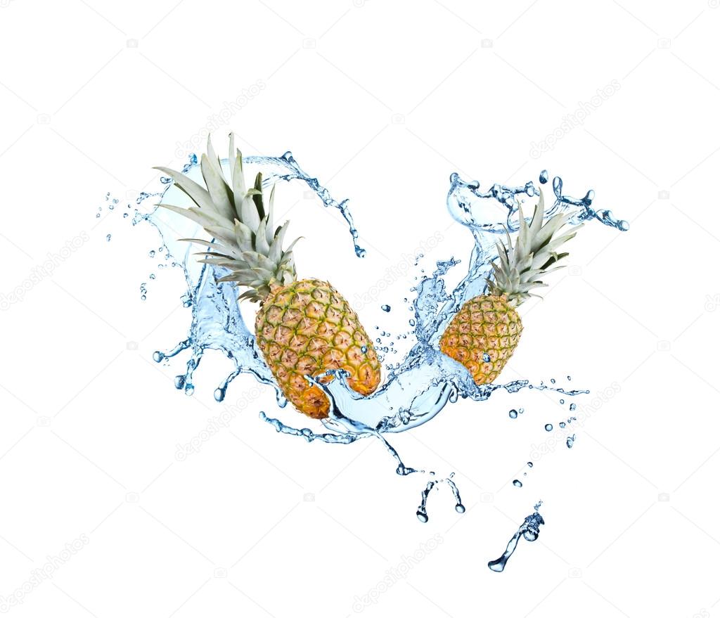 Pineapple falling in water splash Stock Photo by ©habovka 93172646
