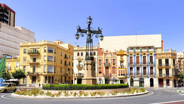 Castellon, Spain. June 14, 2021 - Glorieta de La Farola, or streetlight roundabout, a well-known point of the city, next to the Ribalta Park, connects several avenues to the city center