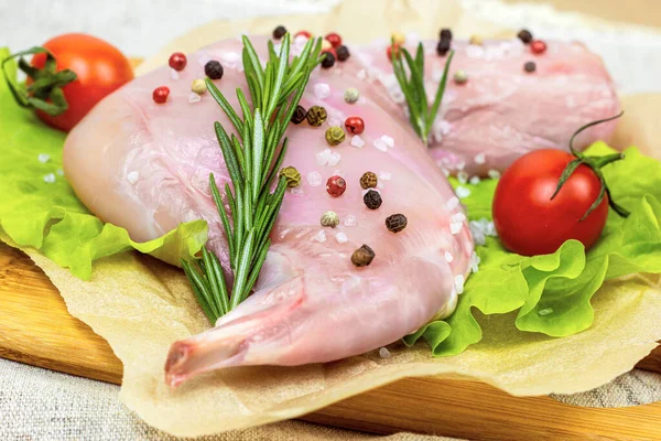 Raw Uncooked Pink Rabbit Leg Meat Green Rosemary Fresh Vegetables — Stock Photo, Image