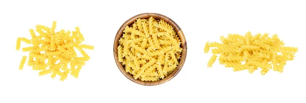 Vista Superior Conjunto Massas Fusilli Amarelo Não Cozido Isolado Fundo — Fotografia de Stock