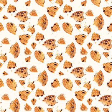 Kırıntılı Amerikan çikolatalı kurabiye parçalarının üst görüntüsü arka planda pürüzsüz desenleri tekrarlıyor.
