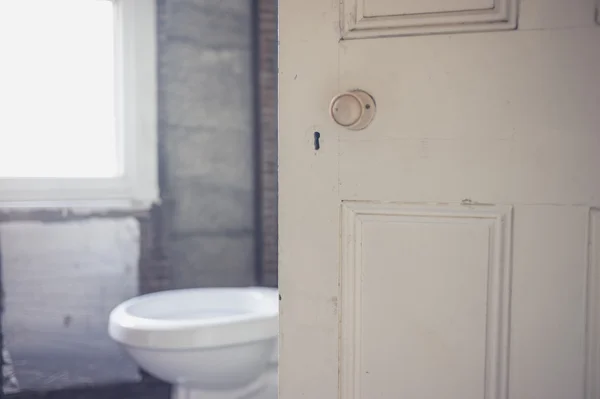 Open door to bathroom — Stock Photo, Image