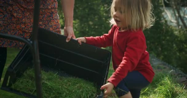 Mother Little Son Gardening Outdoors — Stock Video
