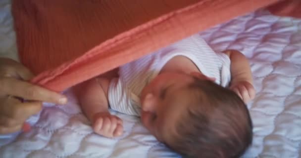 Mother Covering Towel Her Sleeping Newborn Baby Bed — Stock Video