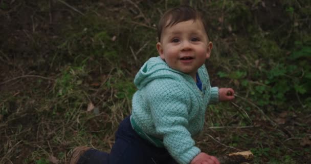 Cute Little Boy Sitting Ground Playing Spring Forest — Stock Video