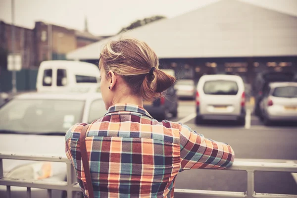 Woman at parking lot — Stock Photo, Image