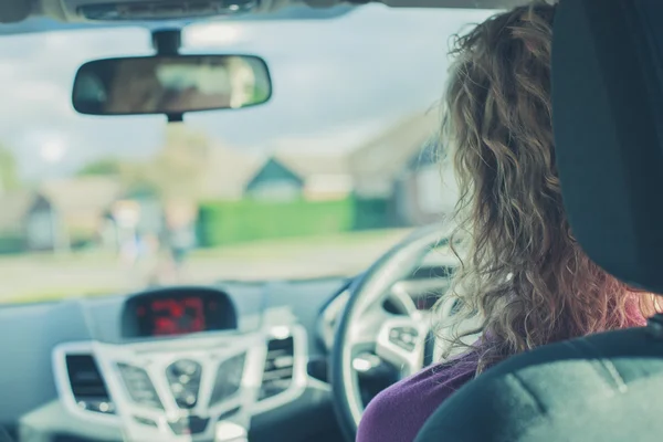 Young woman driving car — Stock Photo, Image