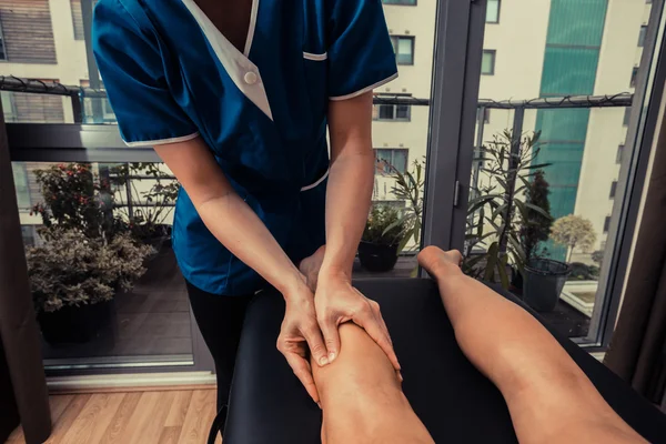 Woman getting leg massage — Stock Photo, Image