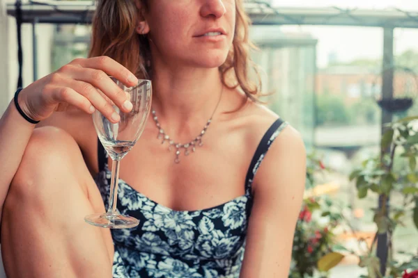 Young woman with glass of wine — Stock Photo, Image