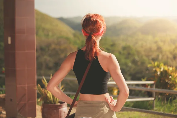 Woman admiring view of chocolate hils in Philippines — Stock Photo, Image